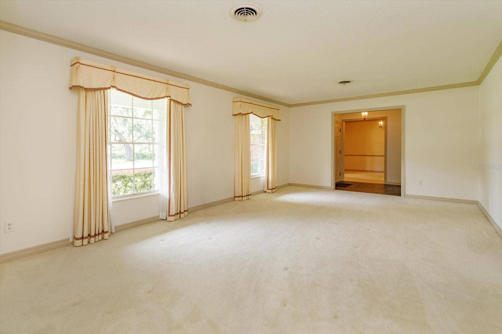 5019 GRAN LAC AVENUE, Orlando, FL 32812 Living Room off foyer