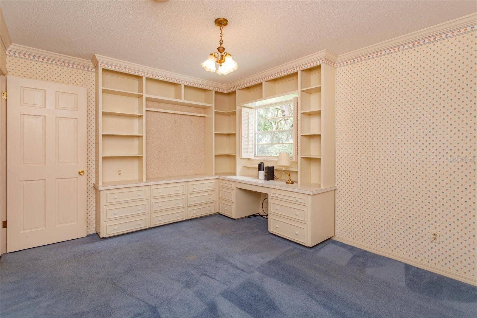 5019 GRAN LAC AVENUE, Orlando, FL 32812 Bedroom 3 has built-in desk storage