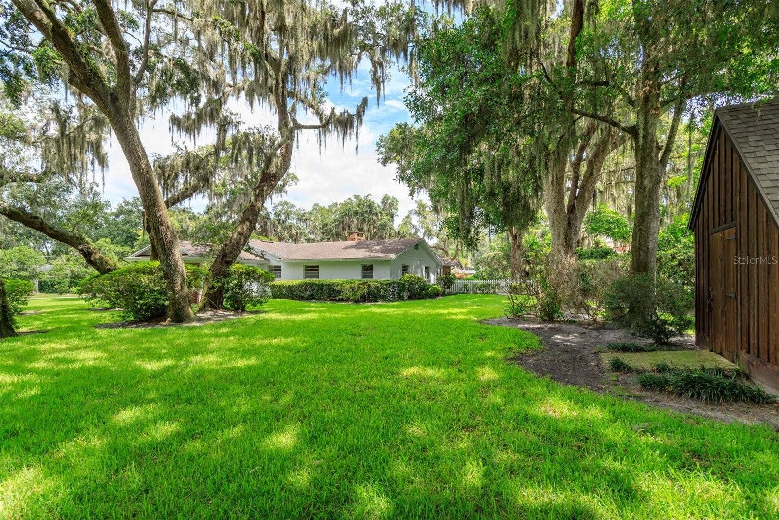5019 GRAN LAC AVENUE, Orlando, FL 32812 Rear yard showing Garden Shed