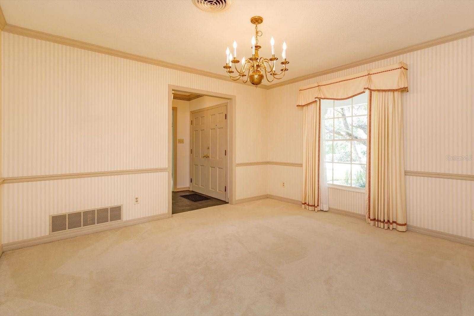 5019 GRAN LAC AVENUE, Orlando, FL 32812 Dining room off foyer