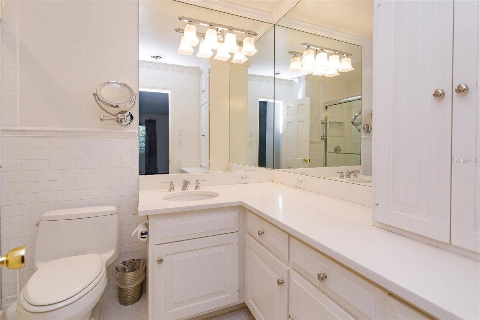 5019 GRAN LAC AVENUE, Orlando, FL 32812 Primary Bath updated quartz counter, sink/faucet, W/C, custom cabinets