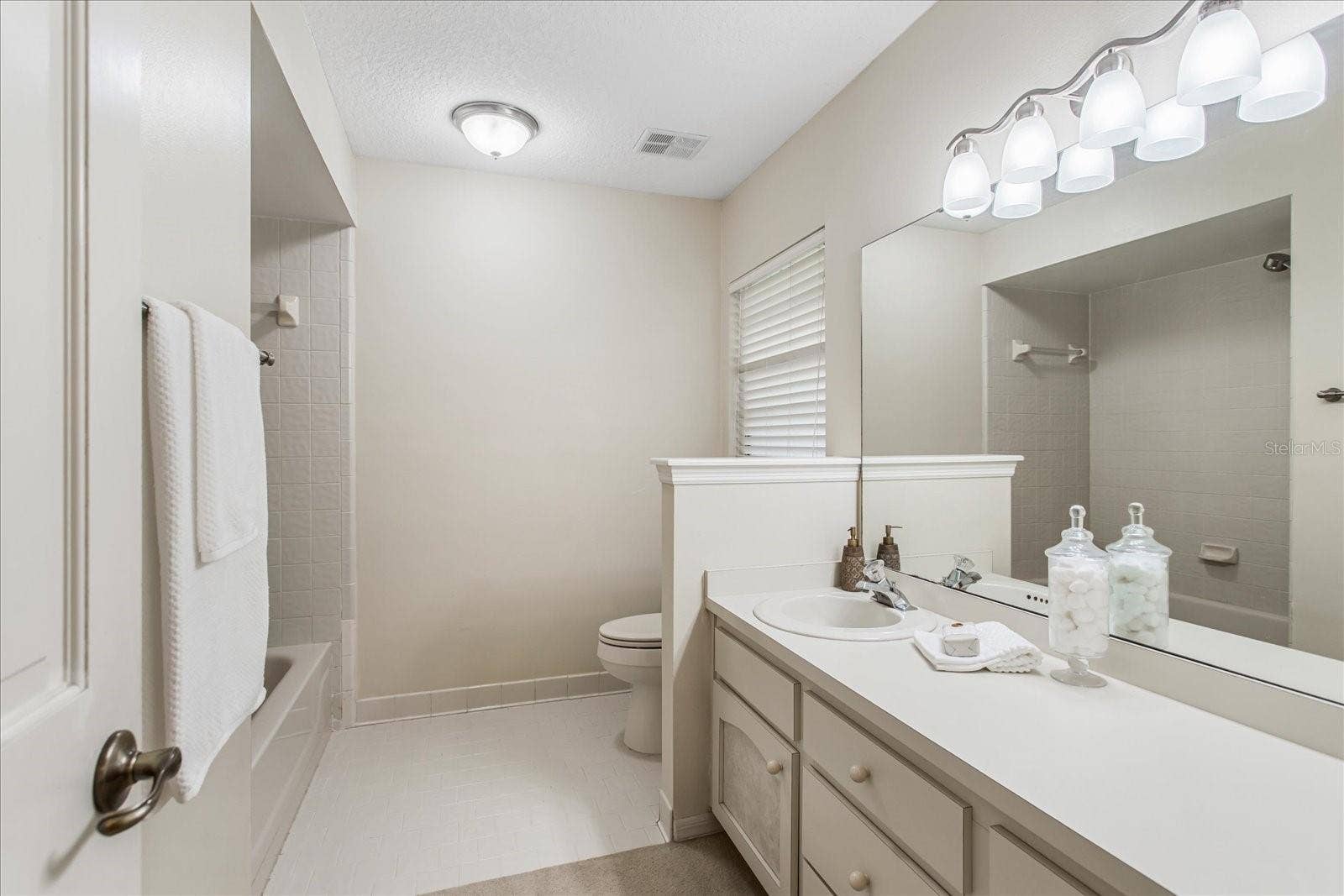 179 GOLF CLUB DRIVE, Longwood, FL 32779 Bathroom 2, large vanity and tub with shower