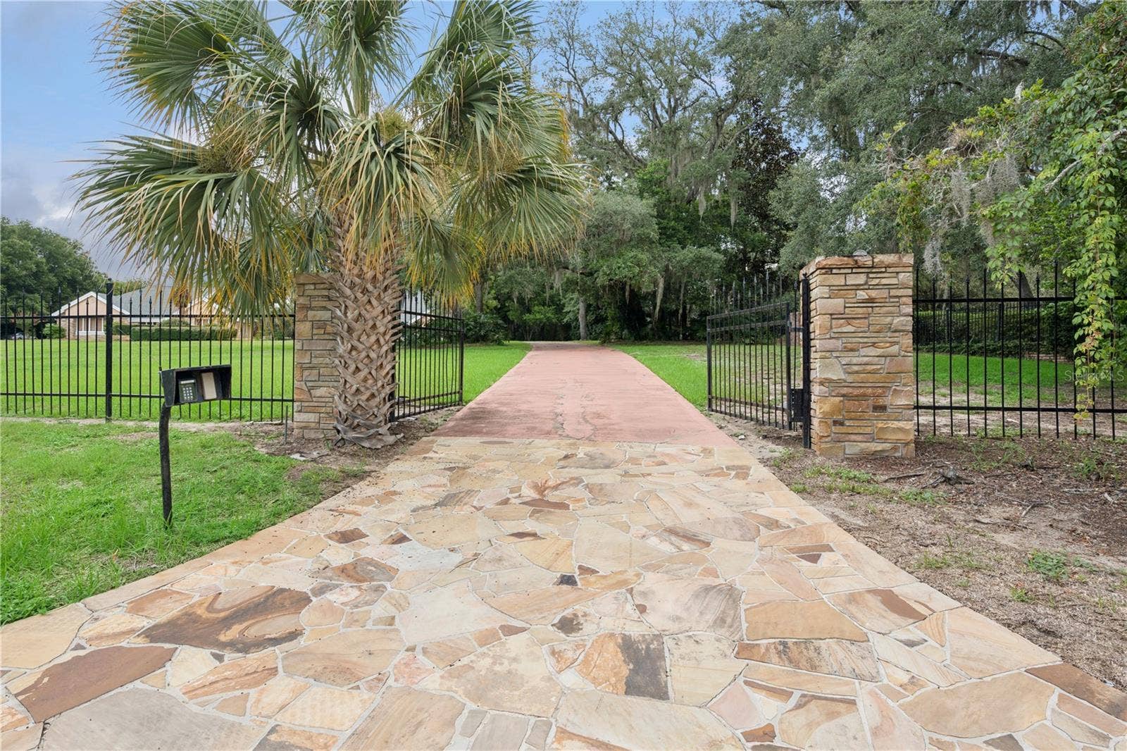 1041 SWEETWATER CLUB BOULEVARD, Longwood, FL 32779 Private Circular Gated Entrance