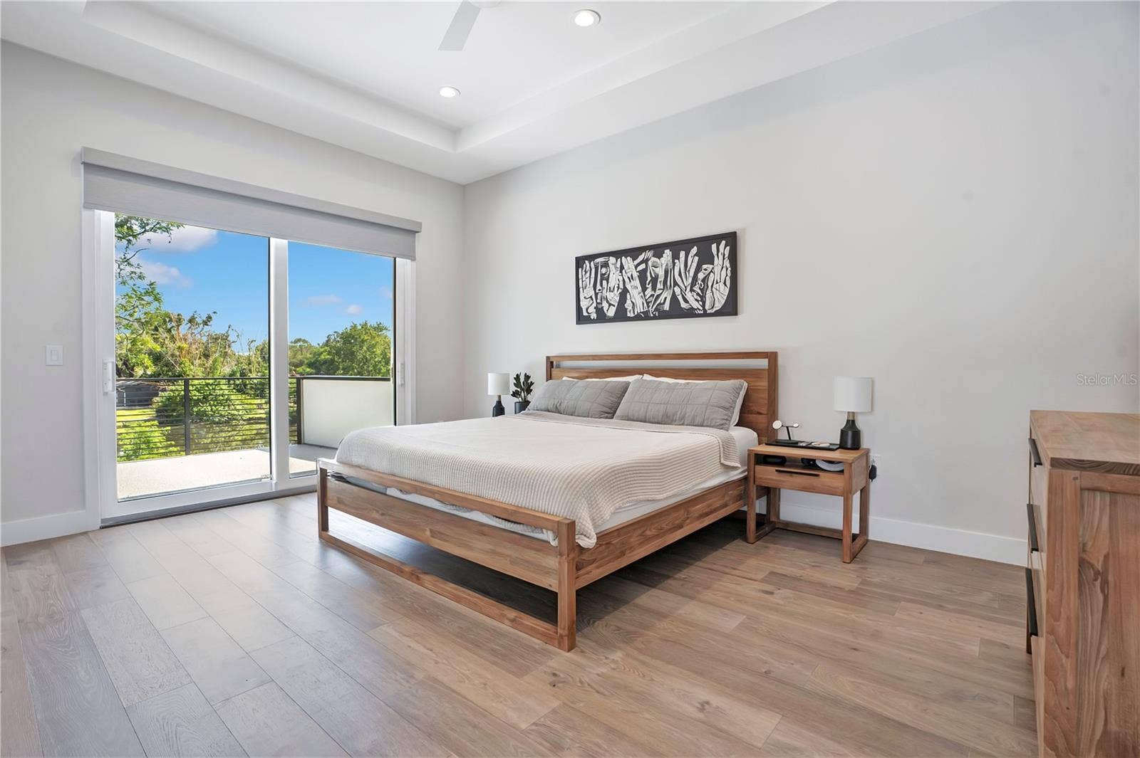 1927 S LAKEMONT AVENUE, Winter Park, FL 32792 Primary bedroom with patio door view.