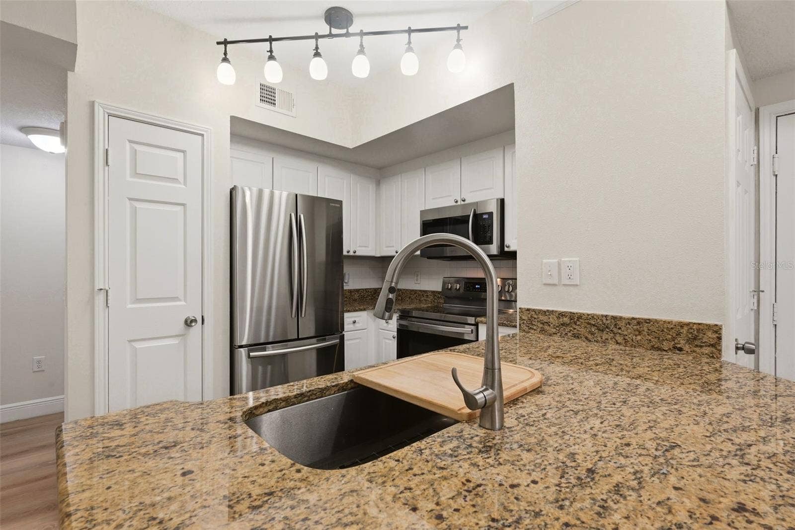 239 LONGVIEW AVENUE, #207, Celebration, FL 34747 Fully Equipped Kitchen with Stainless Steel Appliances