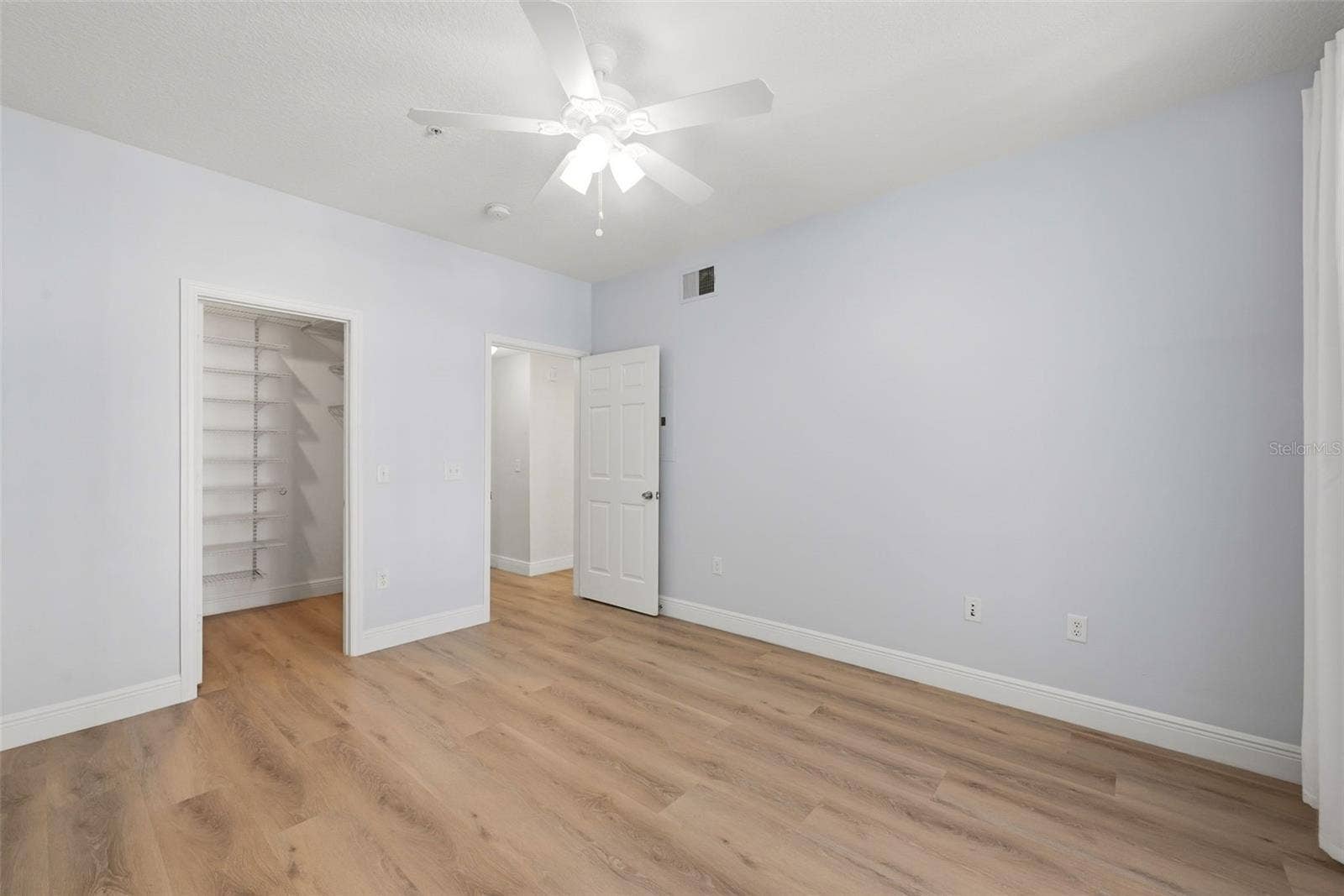 239 LONGVIEW AVENUE, #207, Celebration, FL 34747 Primary Bedroom with Walk-In Closet