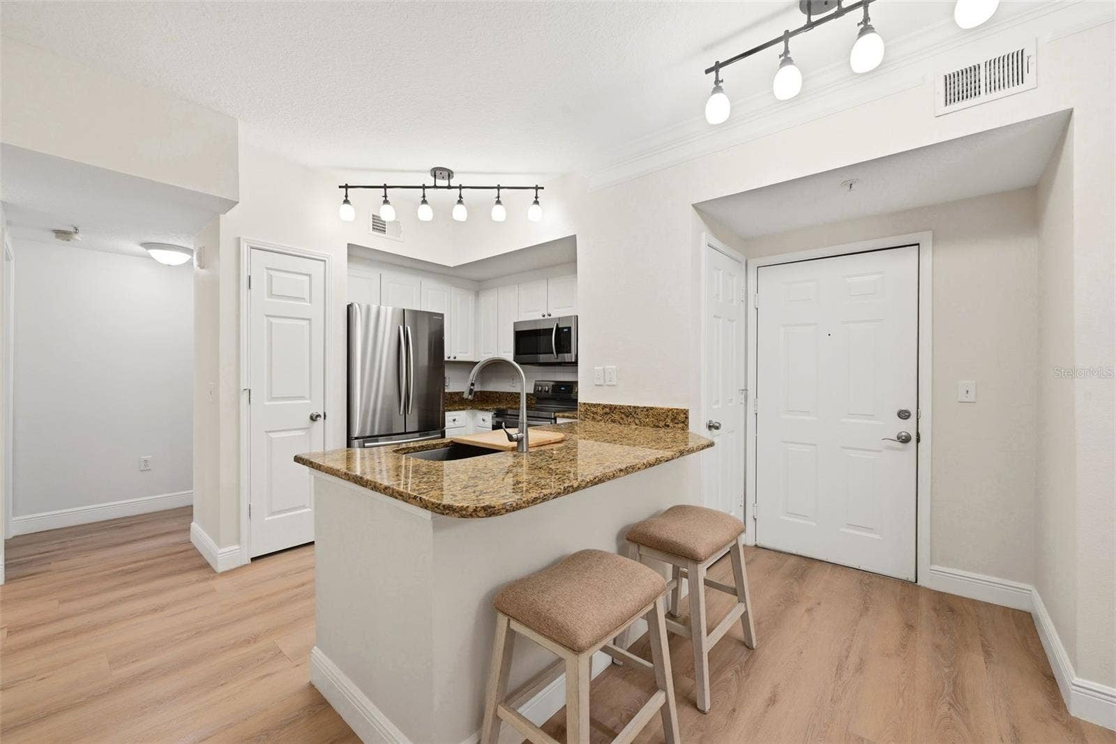 239 LONGVIEW AVENUE, #207, Celebration, FL 34747 Fully Equipped Kitchen with Stainless Steel Appliances
