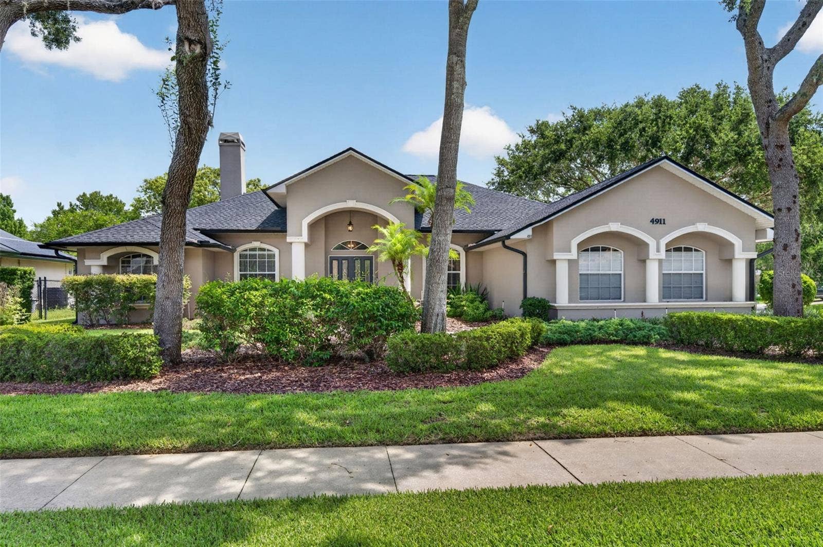 4911 RAYLENE WAY, St Cloud, FL 34771 Welcome home to this 4 bedroom, 3 bath corner lot home!
