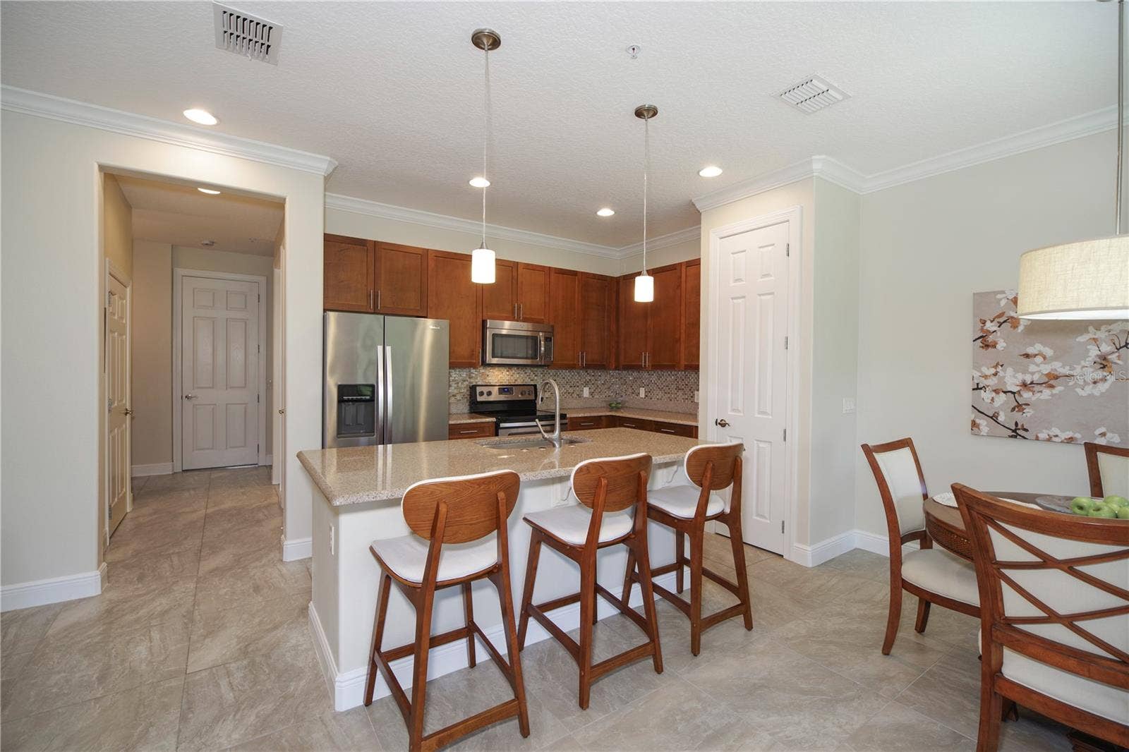 1541 CORKERY COURT, #1541, Winter Springs, FL 32708 KITCHEN WITH BREAKFAST BAR