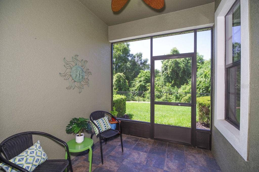 1541 CORKERY COURT, #1541, Winter Springs, FL 32708 SCREENED PORCH WITH SLATE FLOORS OVERLOOKING CONSERVATION, WATER AND GOLF COURSE