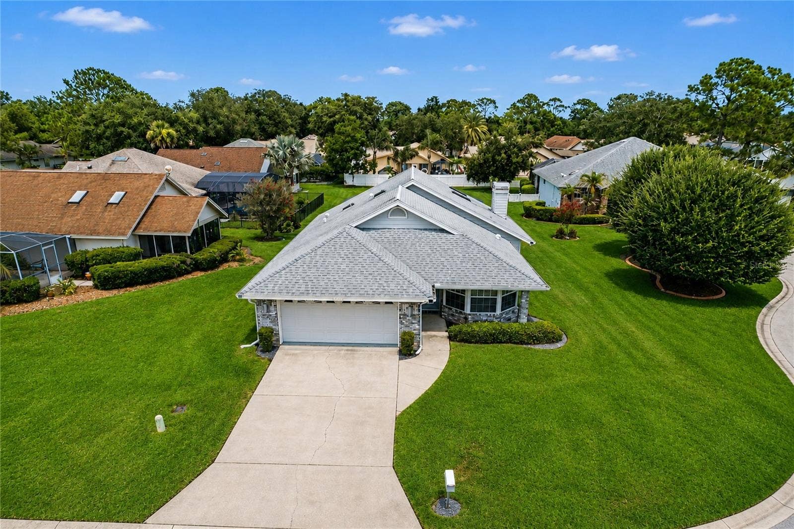 2013 BEAVER CREEK DRIVE, Port Orange, FL 32128 Welcome to this lovely Spruce Creek Fly-In home, ideally situated on nearly half an acre with exceptional space, privacy, and room to grow!