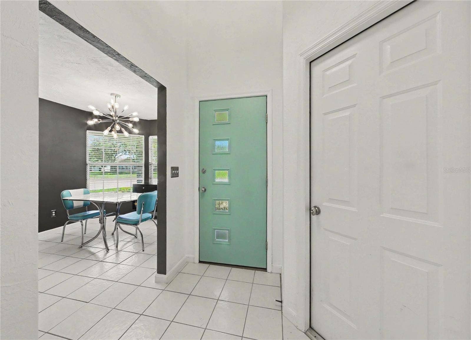 2013 BEAVER CREEK DRIVE, Port Orange, FL 32128 Welcoming foyer featuring a distinctive retro-style front entry door.