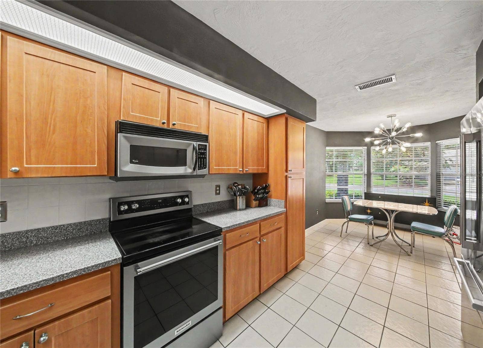 2013 BEAVER CREEK DRIVE, Port Orange, FL 32128 The eat-in kitchen offers plenty of counter space.
