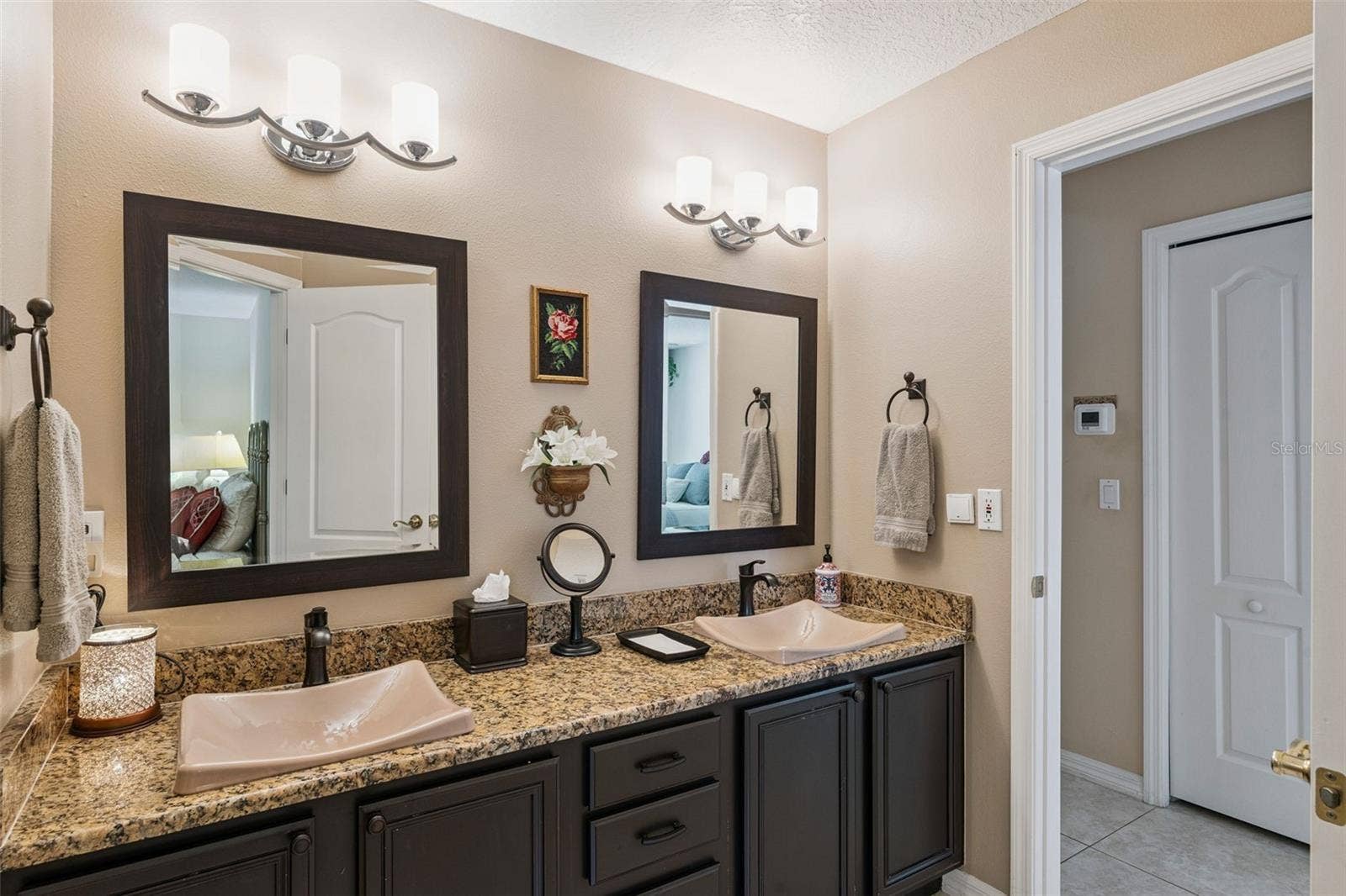 Updated hallway bathroom located in between bedroom 2 &3