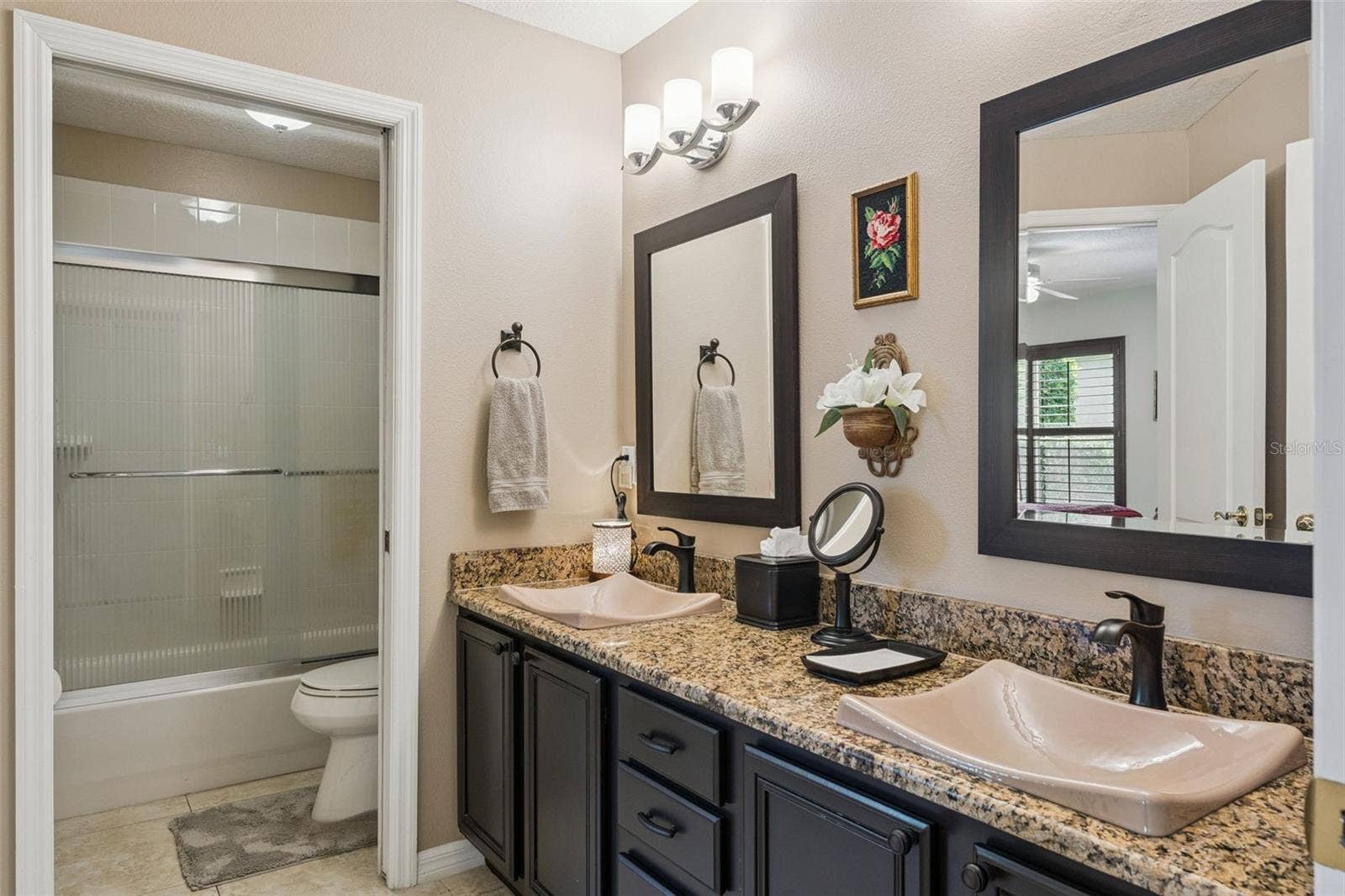 Updated hallway bathroom located in between bedroom 2 & 3