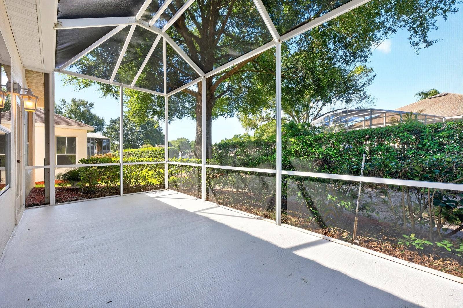 The back patio and screened lanai