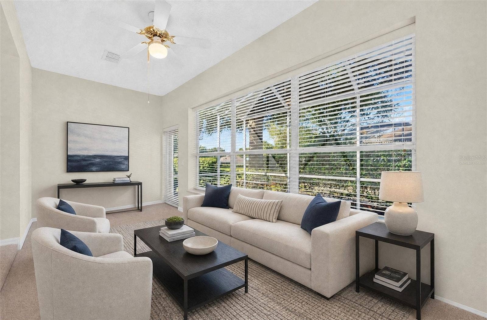 Just off the Living Room, a BONUS SUNROOM offers a bright and relaxing retreat overlooking the BACKYARD PATIO AND LANAI. Virtually Staged