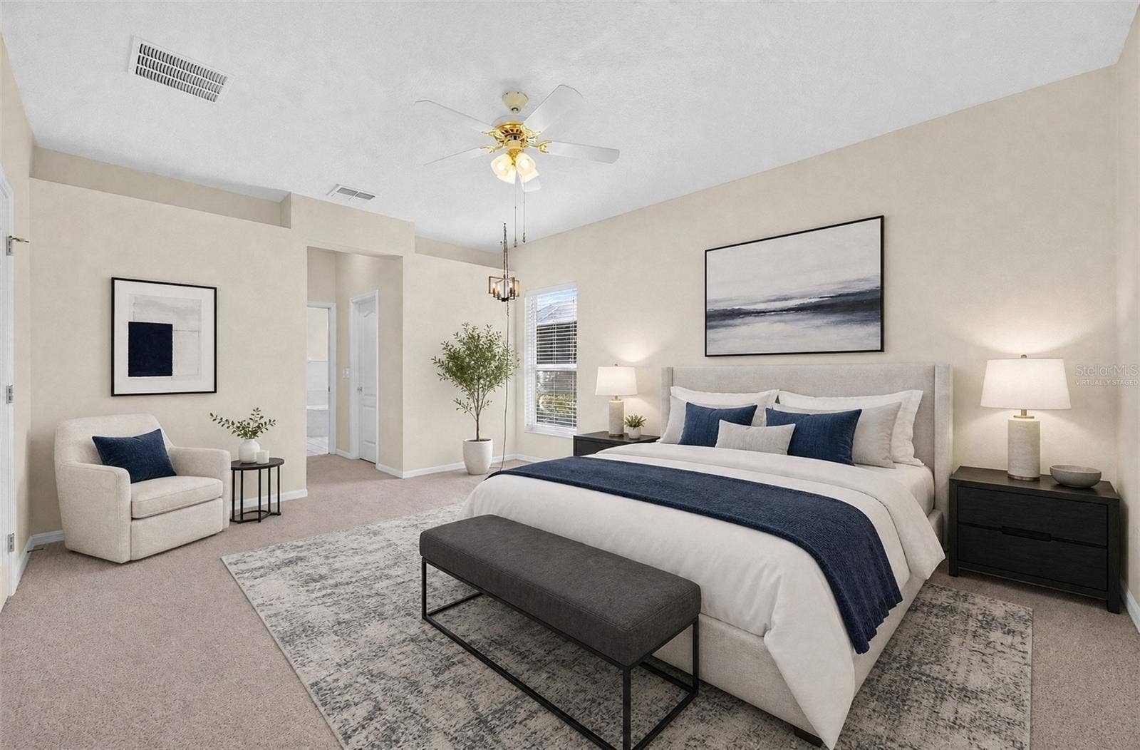 The PRIMARY SUITE provides a comfortable place to unwind, with DUAL WALK-IN CLOSETS and a PRIVATE EN SUITE BATH. Virtually Staged