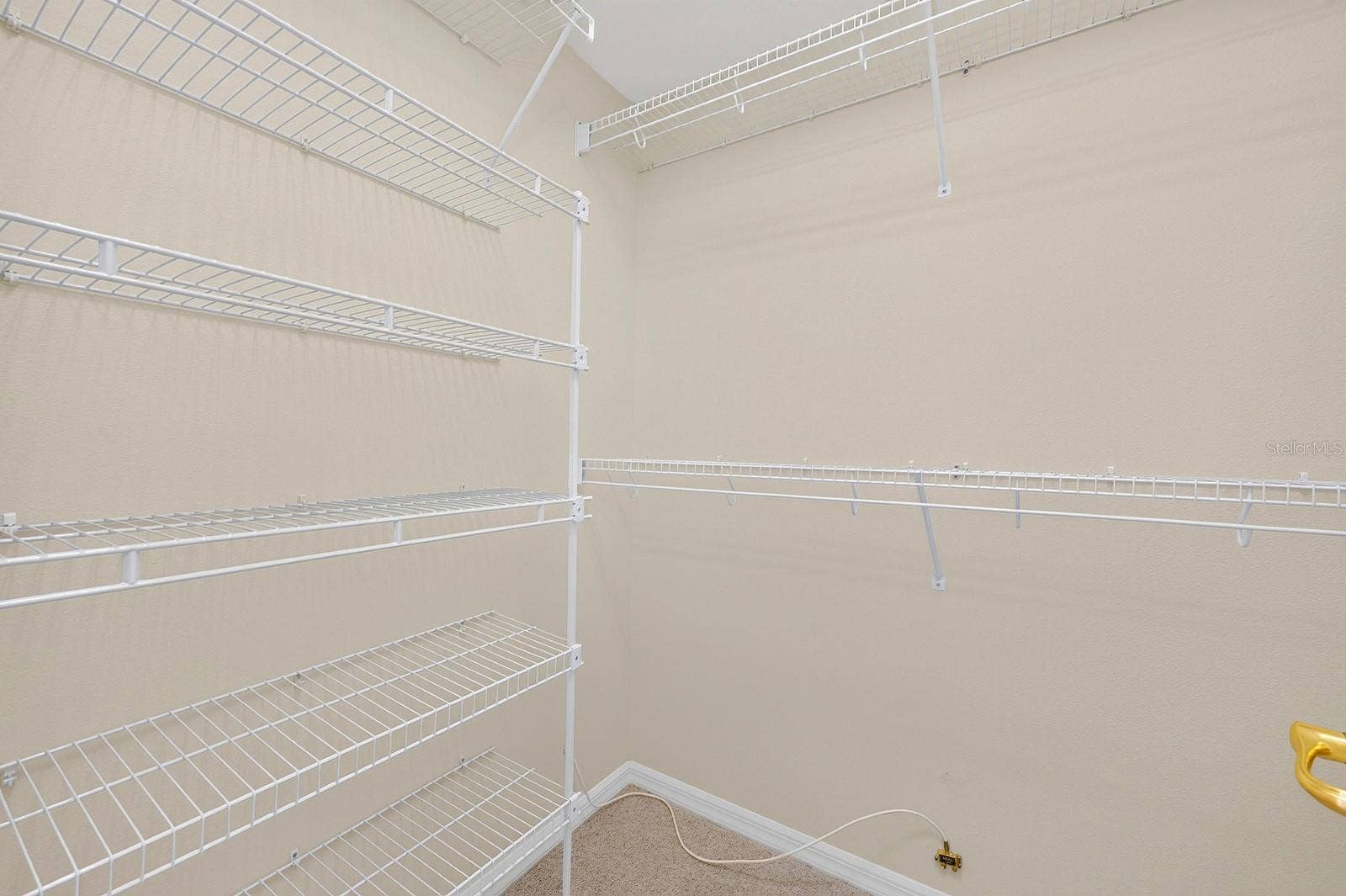 The Primary Suite boasts dual walk-in closets.