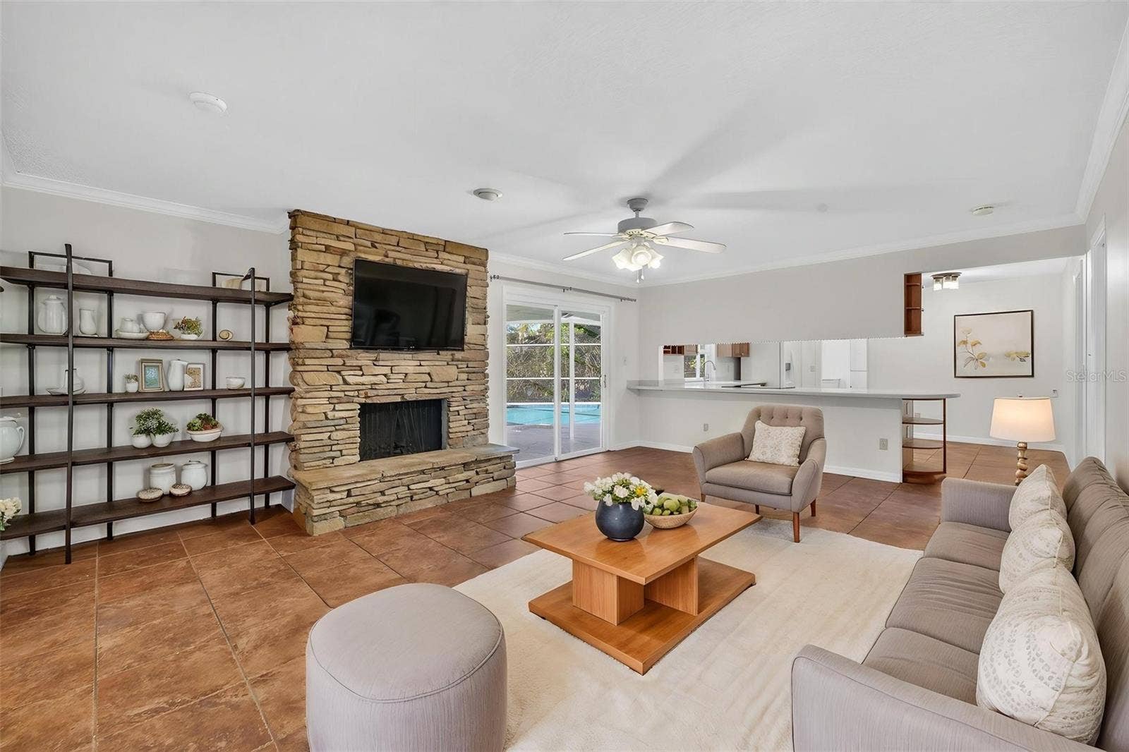 2051 DYAN WAY, Maitland, FL 32751 Family room with wood-burning fireplace