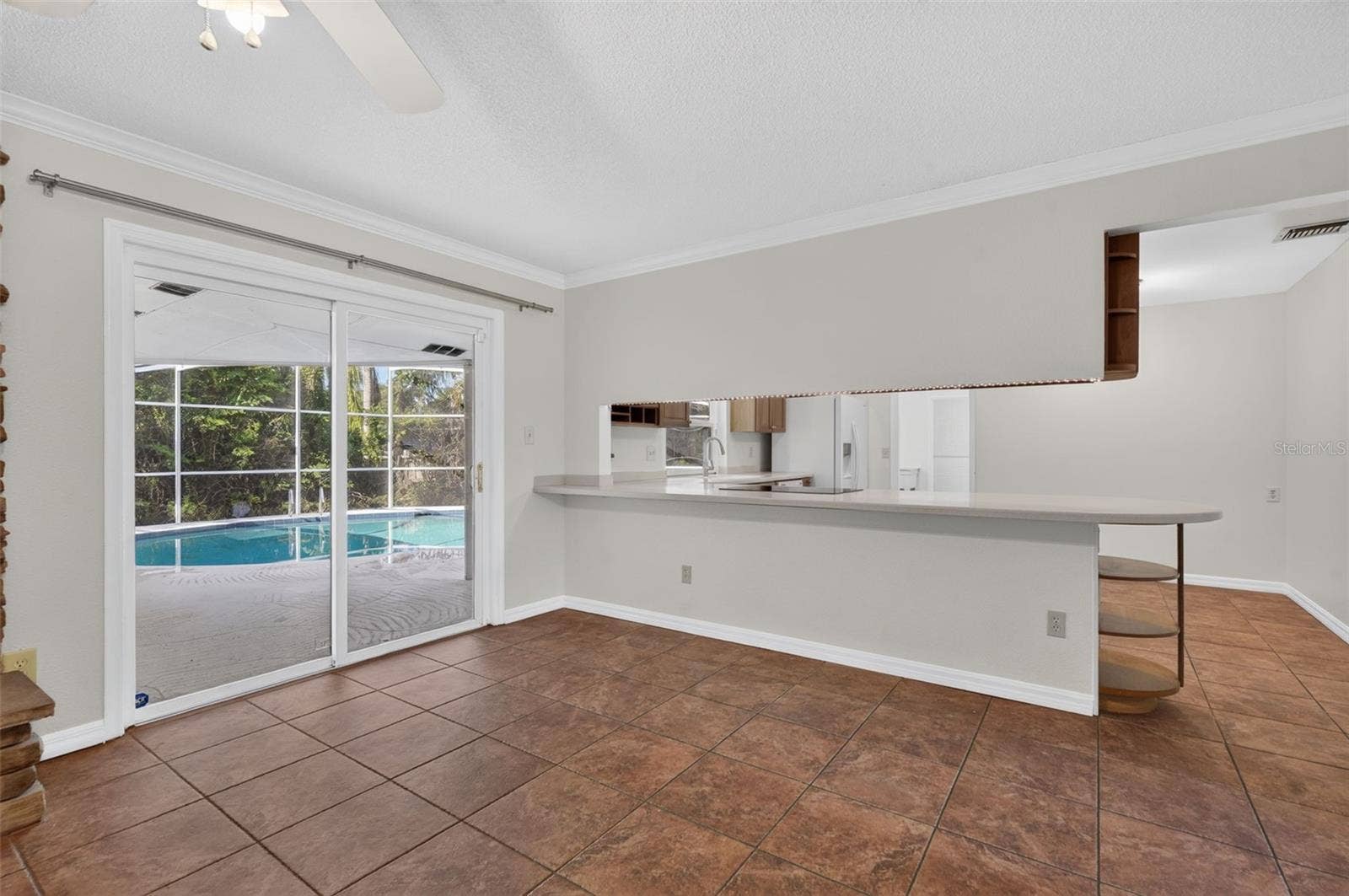 2051 DYAN WAY, Maitland, FL 32751 Sliders lead out to screened patio