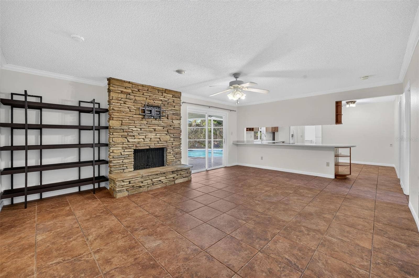 2051 DYAN WAY, Maitland, FL 32751 Family room with built-in shelving