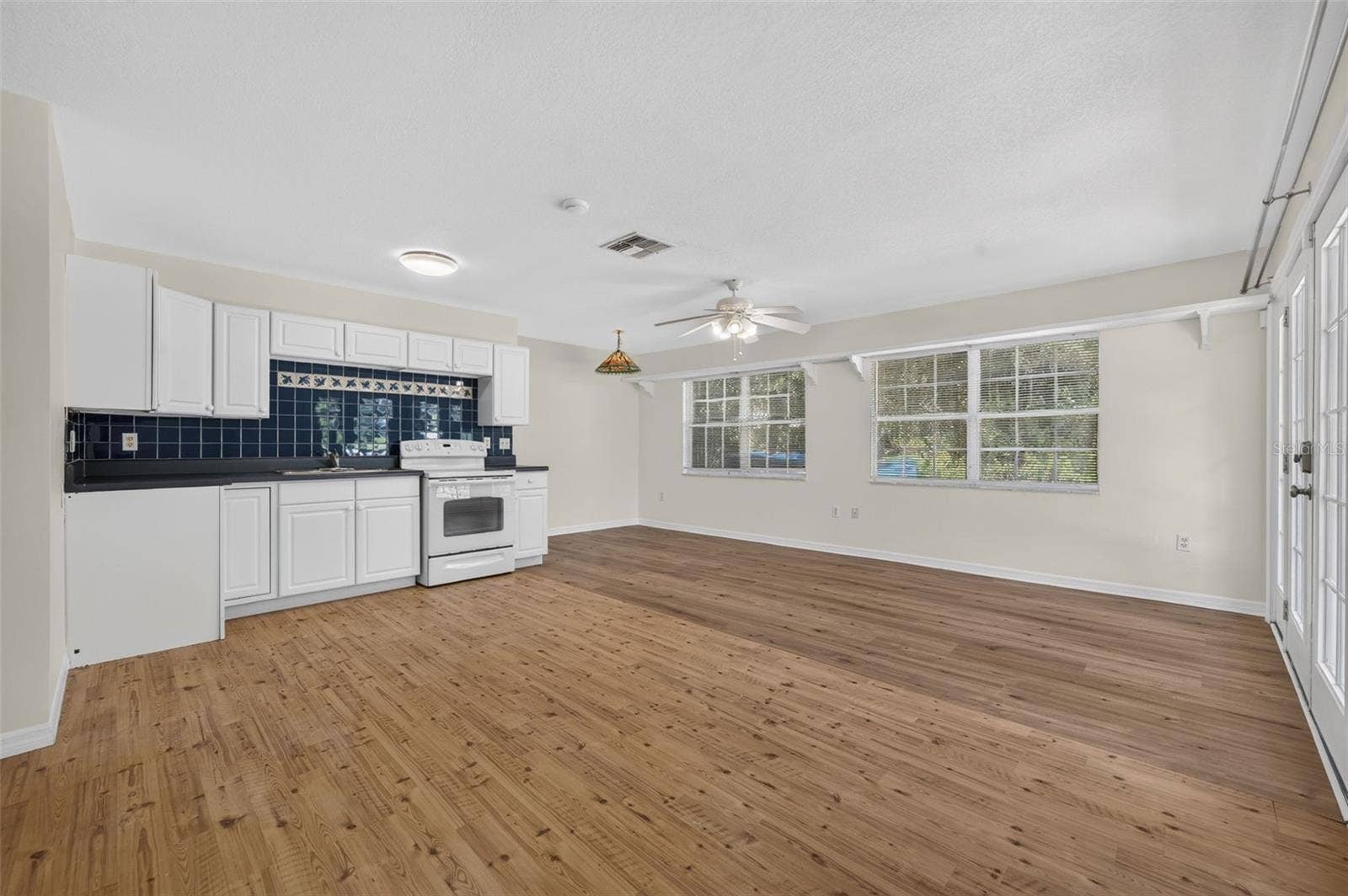 2051 DYAN WAY, Maitland, FL 32751 Living room, eat-in space space and kitchenette in in-law suite