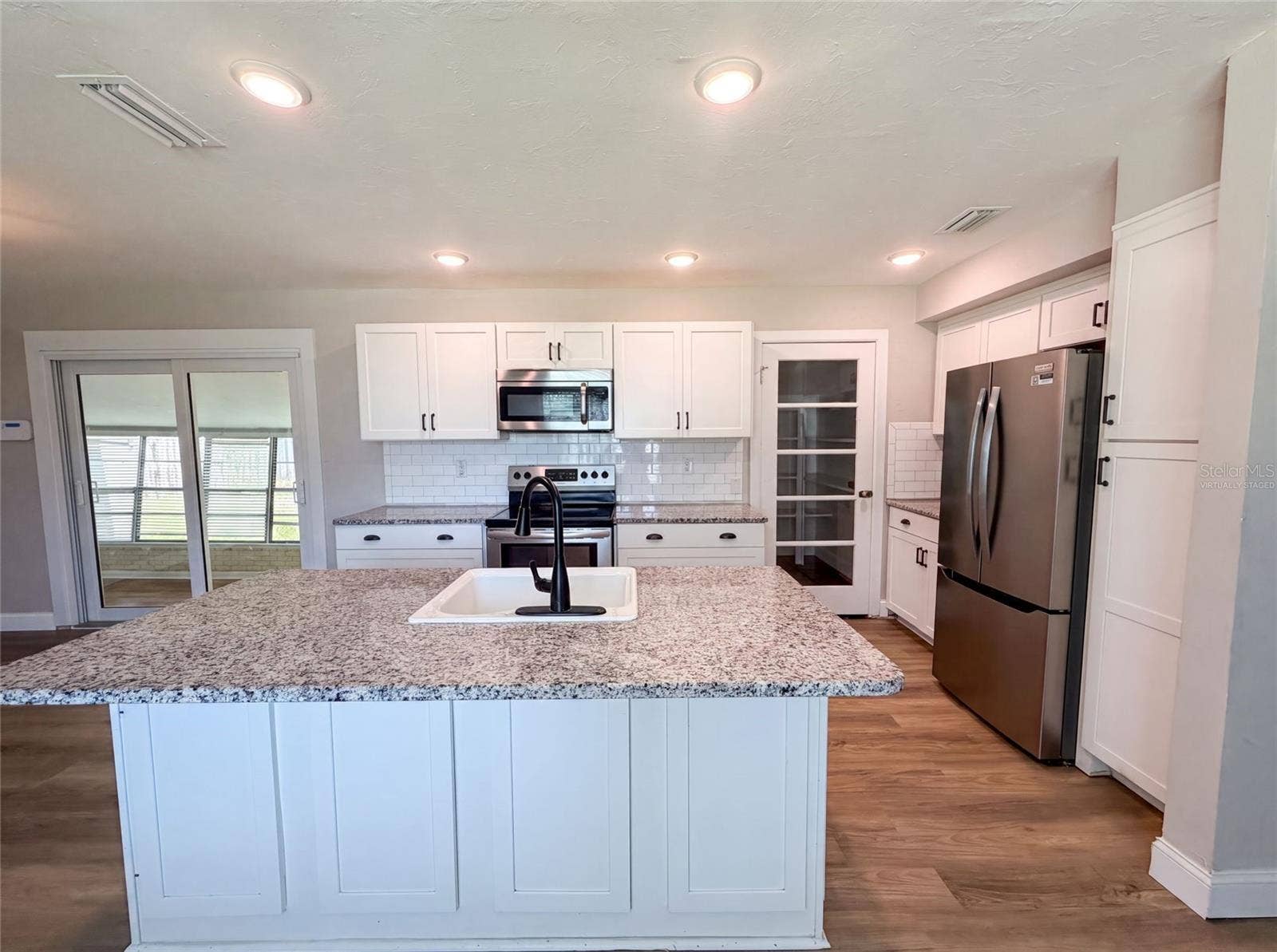 1521 W RIVER SHORE WAY, Tampa, FL 33603 Virtually Staged