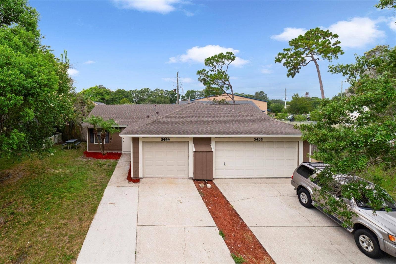 5444 PEACO PLACE, Winter Park, FL 32792 Exterior and 1 car garage