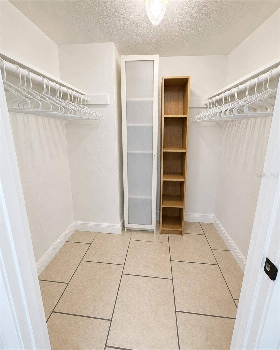 4001 WOODFERN DRIVE, #C1, Orlando, FL 32839 Primary Walk In Closet