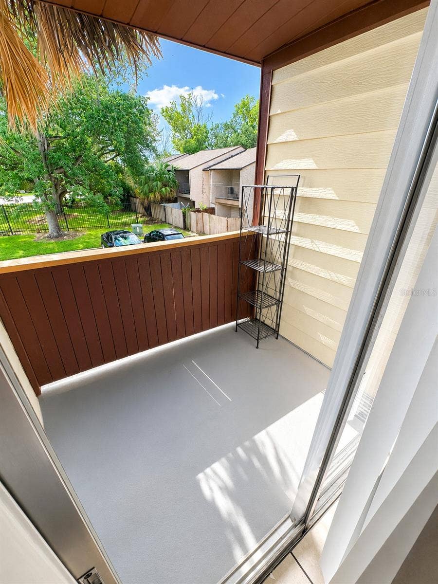 4001 WOODFERN DRIVE, #C1, Orlando, FL 32839 Primary Suite Balcony