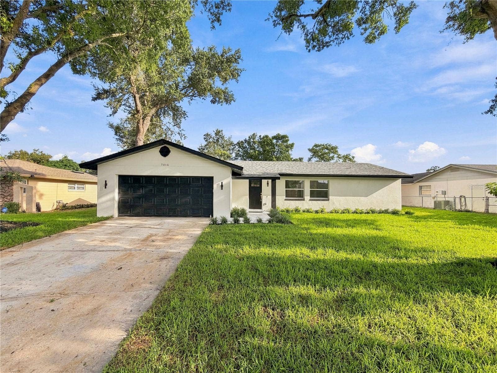 7015 CRESTLAKE DRIVE, Orlando, FL 32819 Front of House
