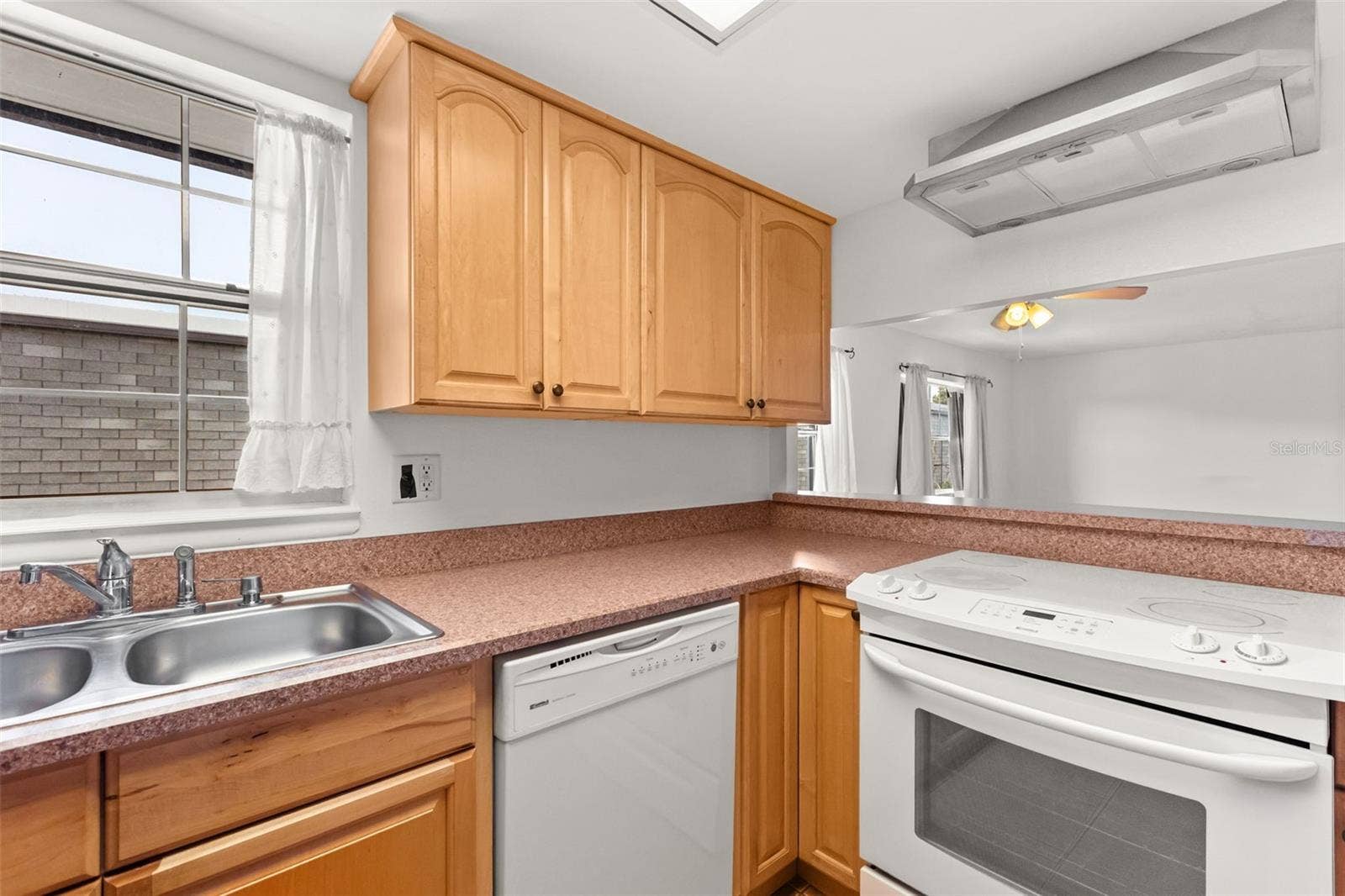 1000 S SEMORAN BOULEVARD, #302, Winter Park, FL 32792 Kitchen open to living area