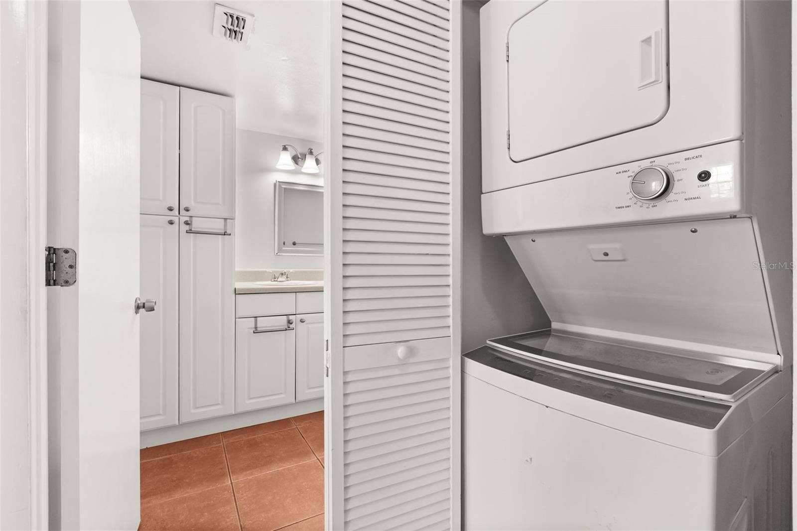 1000 S SEMORAN BOULEVARD, #302, Winter Park, FL 32792 washer and dryer inside the unit