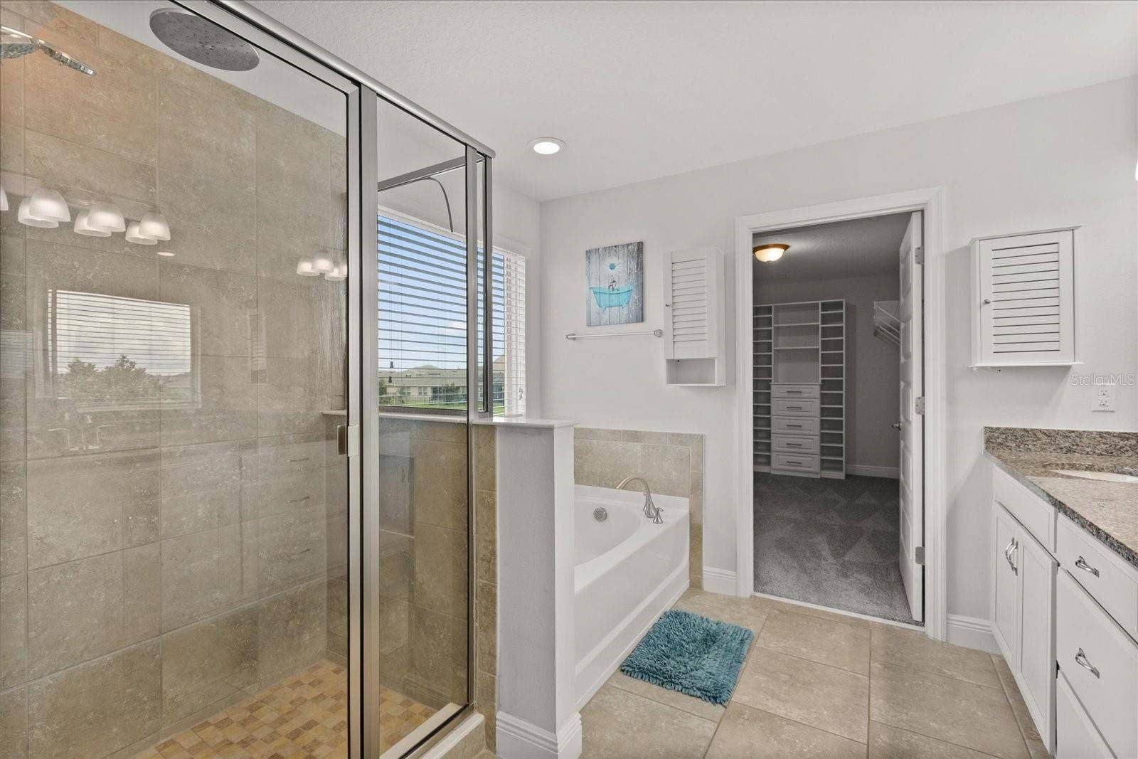 16124 AZURE KEY STREET, Winter Garden, FL 34787 Master Bathroom Walk-in shower and separate large bathtub