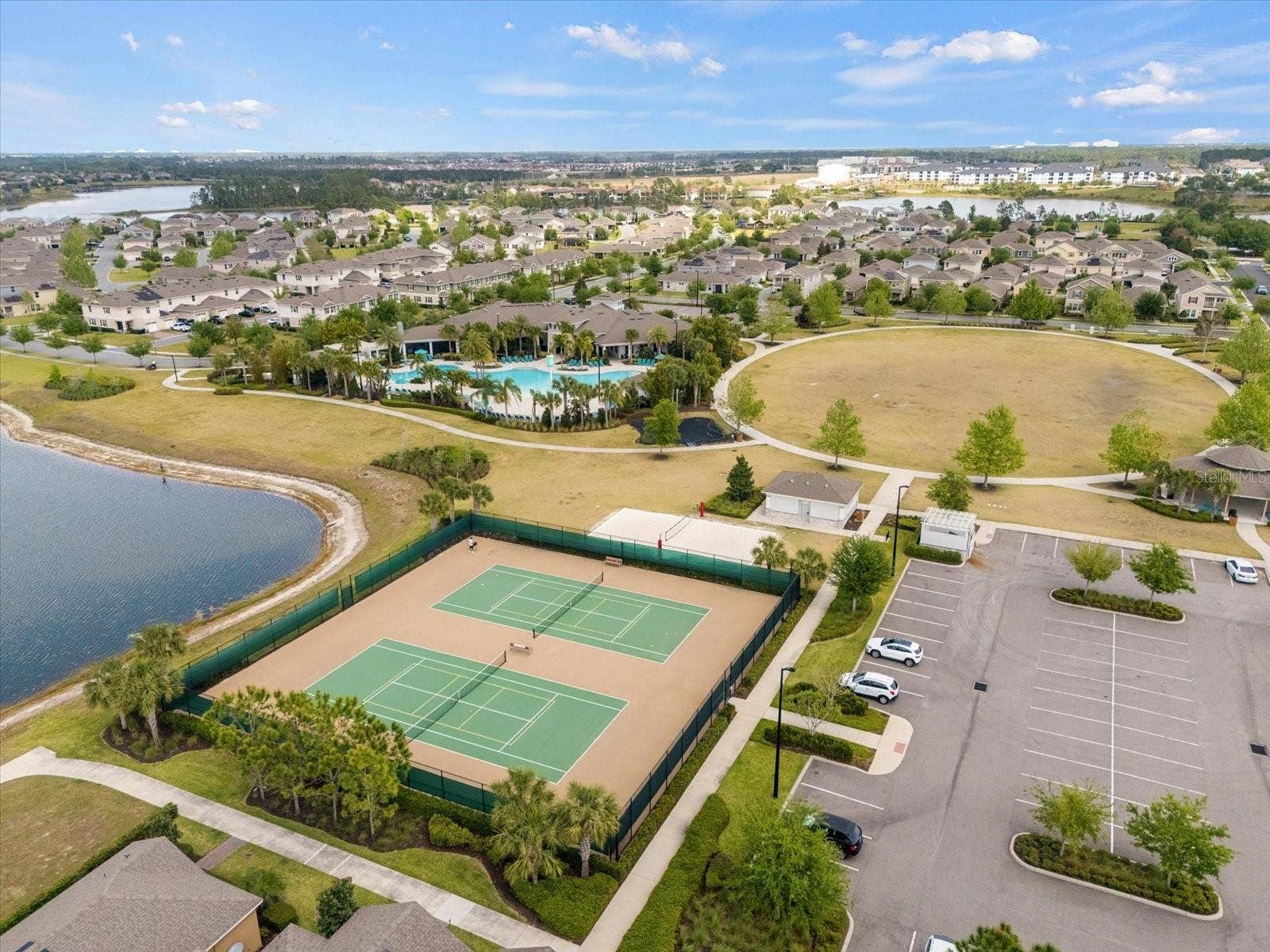16124 AZURE KEY STREET, Winter Garden, FL 34787 neighborhood tennis courts with lots of parking and bathrooms