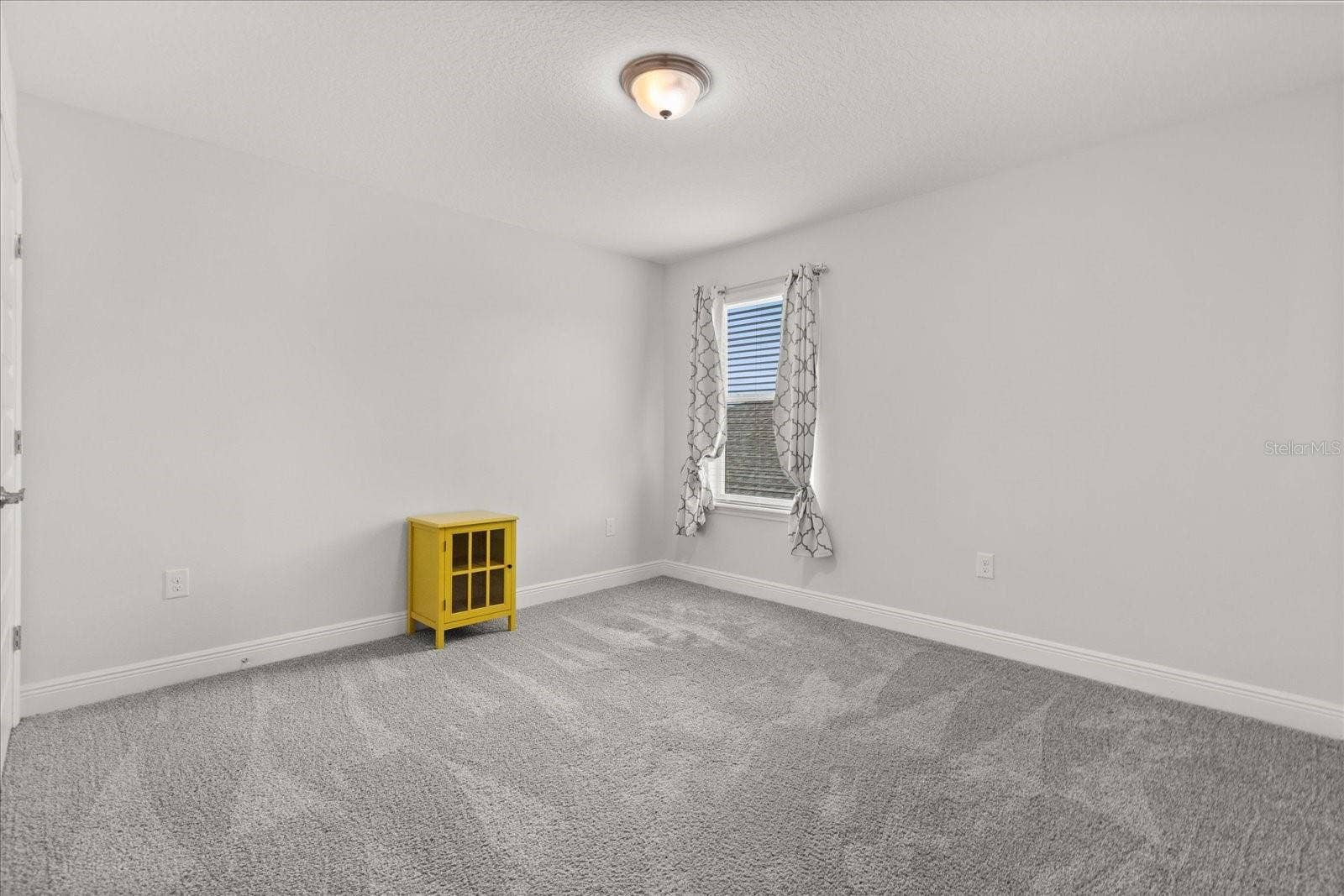 16124 AZURE KEY STREET, Winter Garden, FL 34787 Large upstairs bedroom/office with spacious closet next to bathroom with dual sinks.