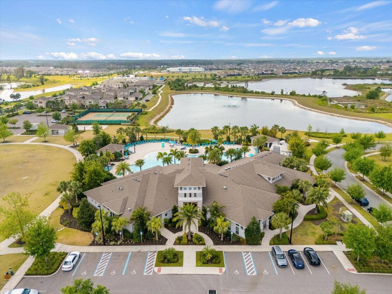 16124 AZURE KEY STREET, Winter Garden, FL 34787 Neighborhood Large Clubhouse w/ large fitness center, tennis courts, huge pool, volleyball, sports field, playgrounds, etc.