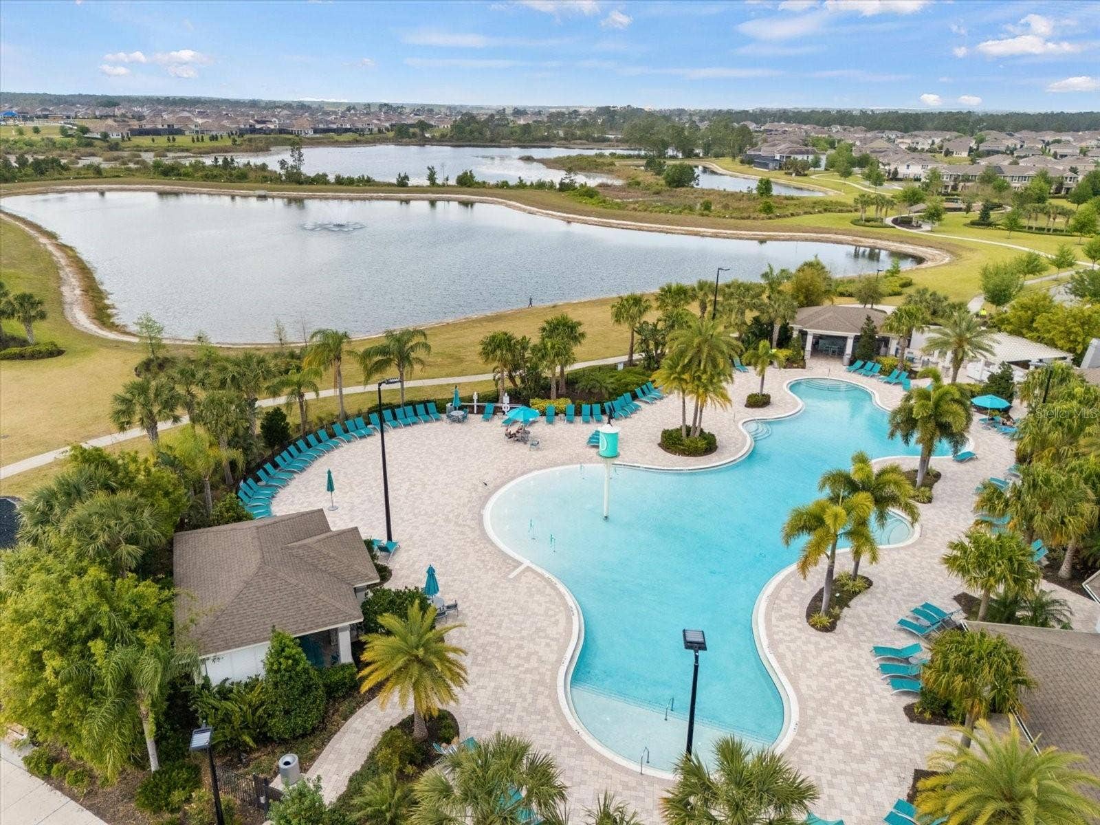 16124 AZURE KEY STREET, Winter Garden, FL 34787 Huge neighborhood Pool behind clubhouse overlooking beautiful lake