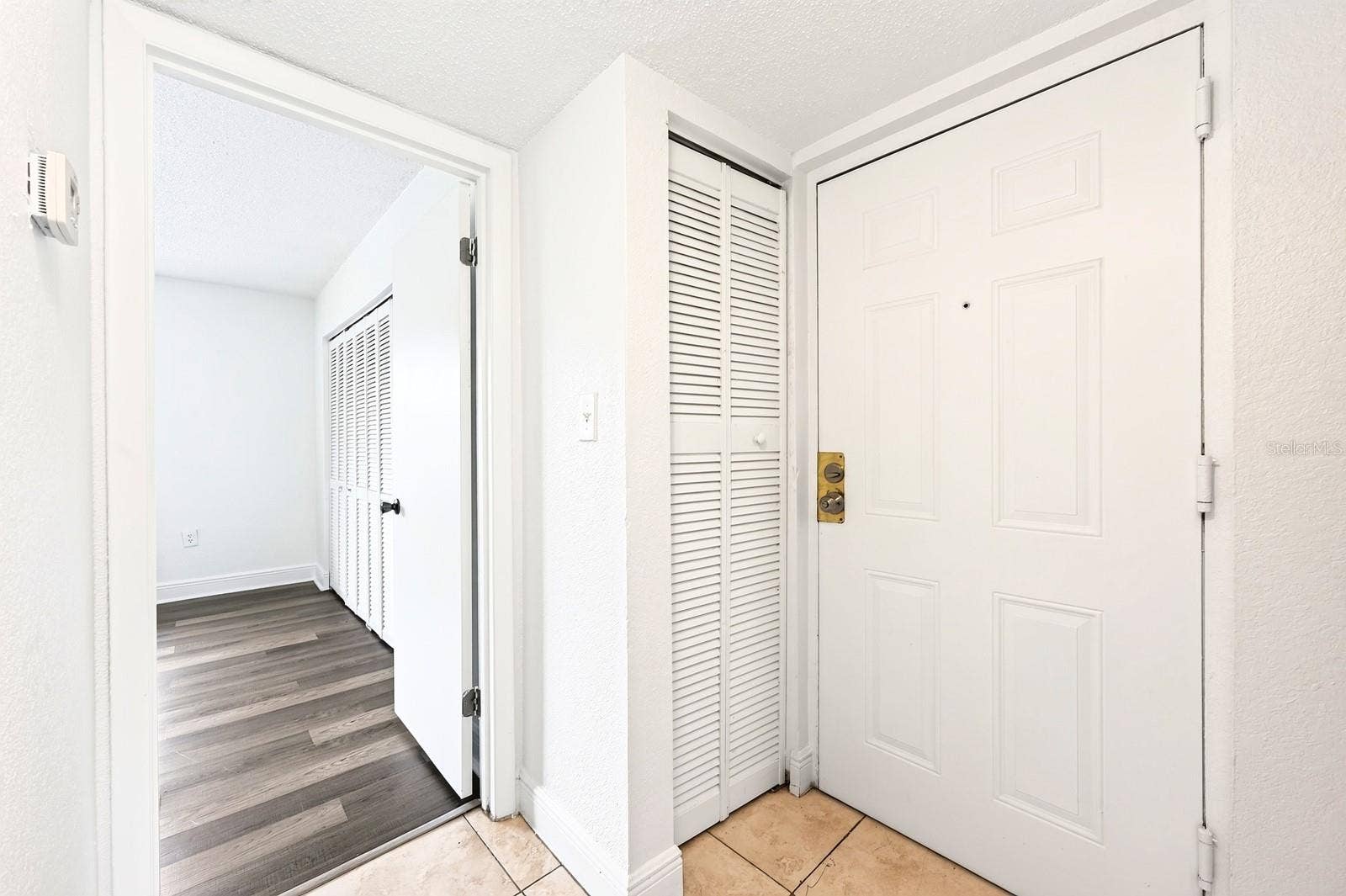 4737 S TEXAS AVENUE, #4737D, Orlando, FL 32839 Entry way with coat closet