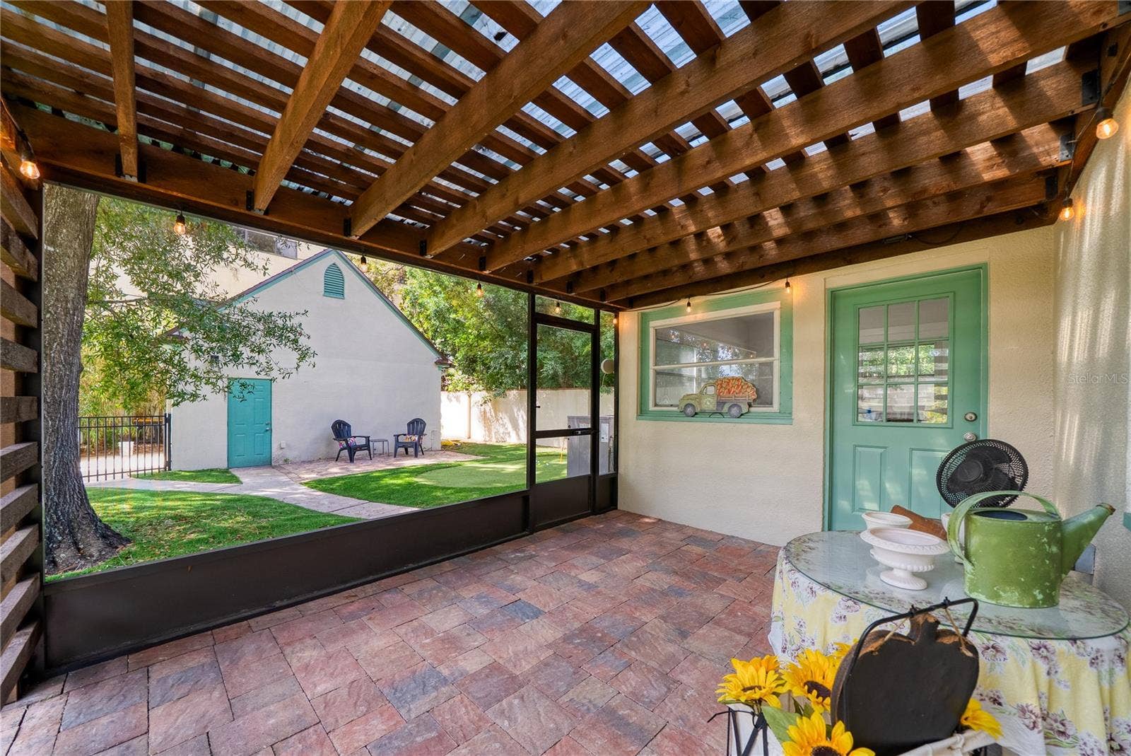 1216 GOLDEN LANE, Orlando, FL 32804 Screened back porch.