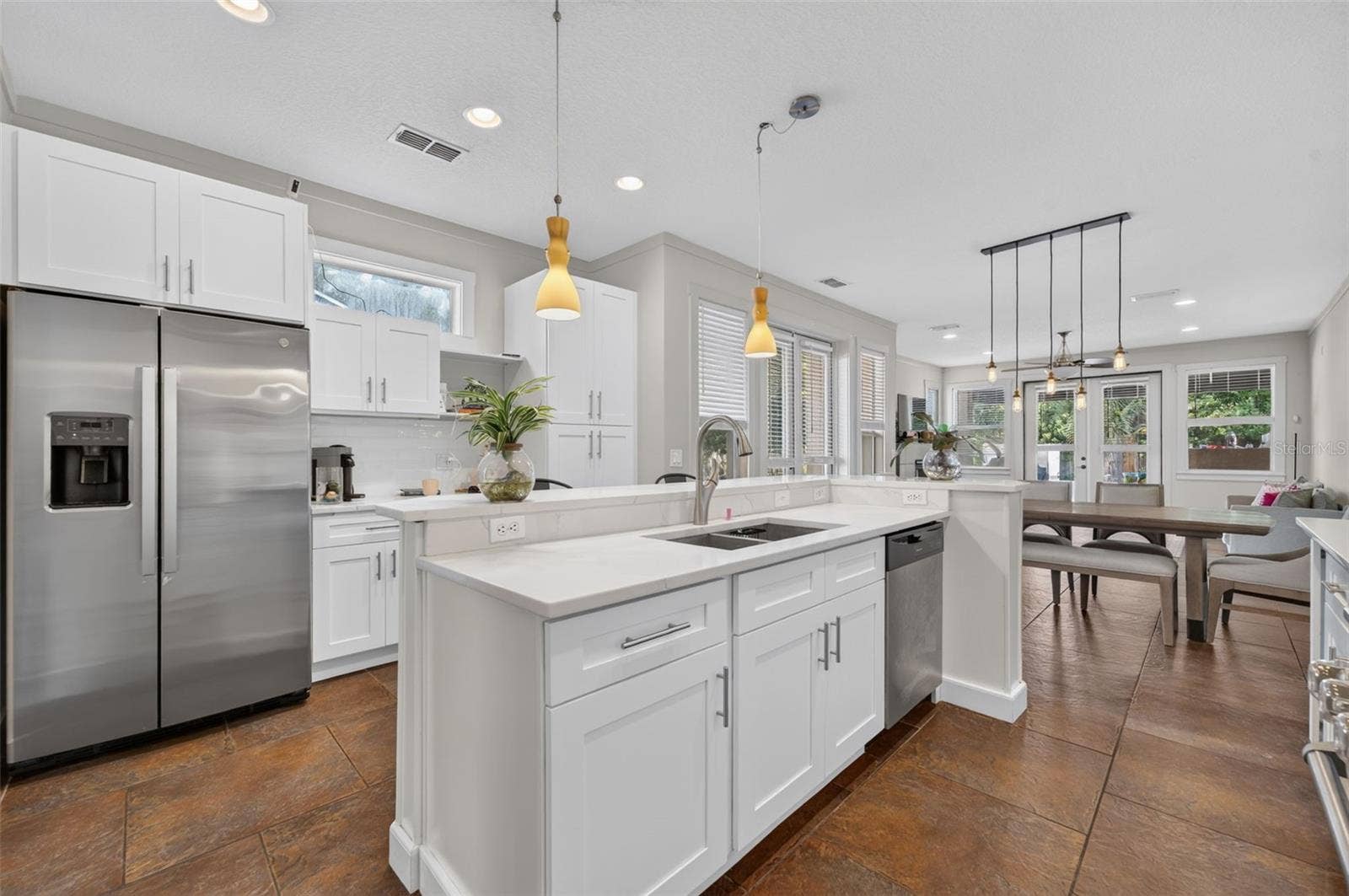 1071 ARAGON AVENUE, Winter Park, FL 32789 Kitchen area with extra storage around fridge