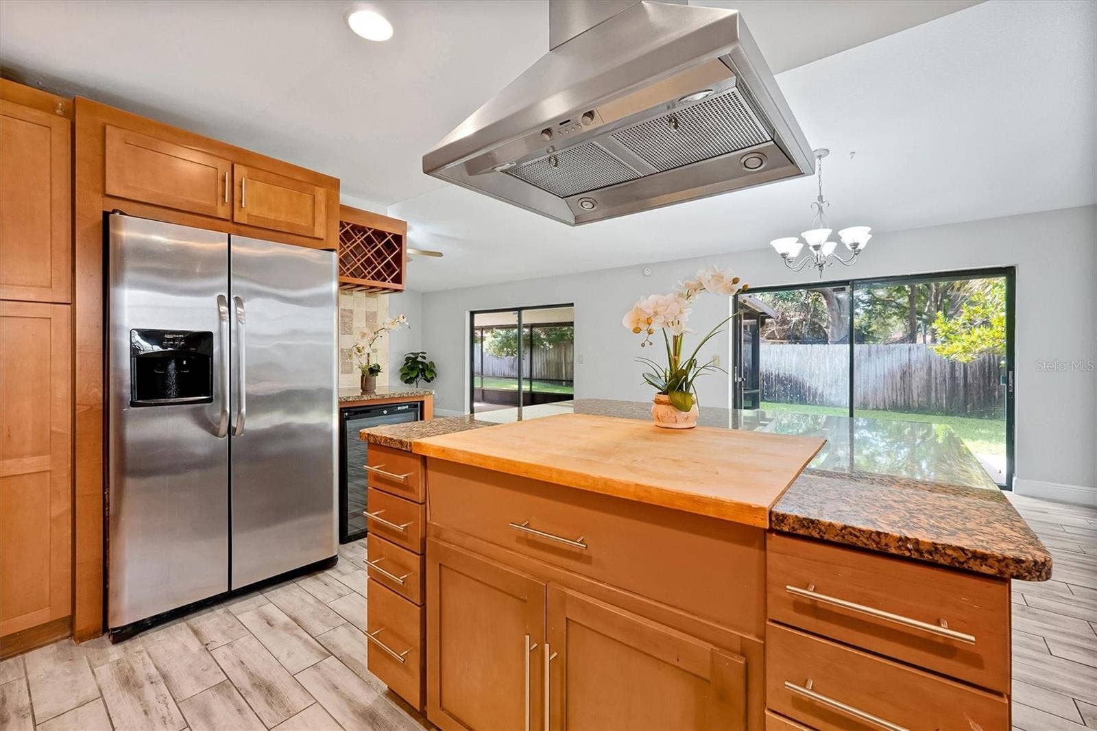 8405 WAIALAE COURT, Orlando, FL 32819 Kitchen with butcher block island