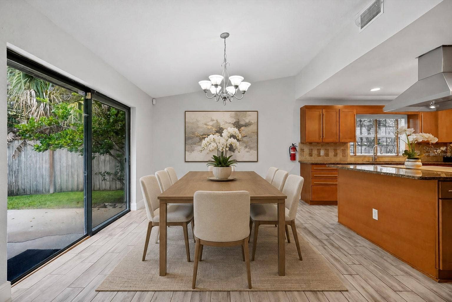 8405 WAIALAE COURT, Orlando, FL 32819 Dining room virtually staged