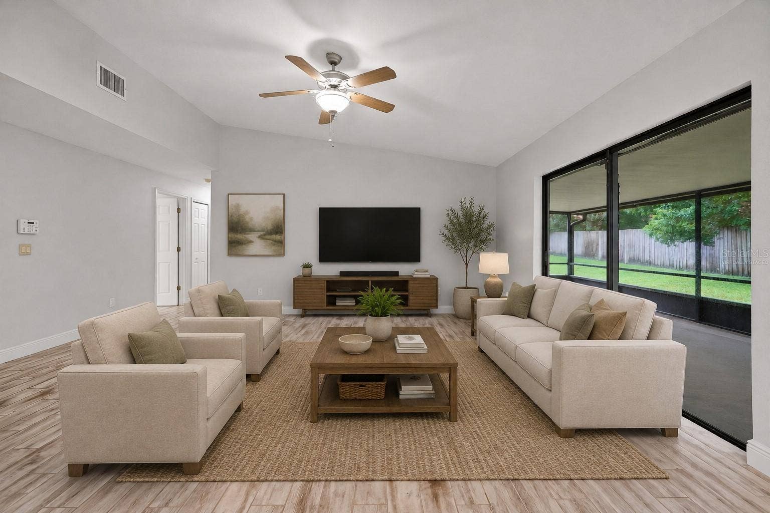 8405 WAIALAE COURT, Orlando, FL 32819 Living room virtually staged