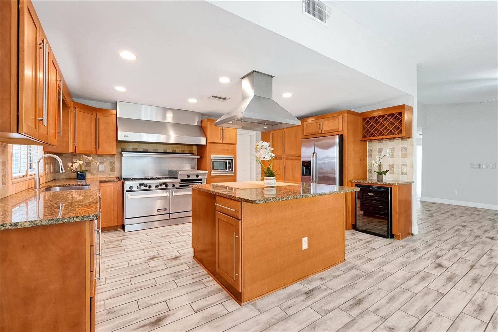 8405 WAIALAE COURT, Orlando, FL 32819 Kitchen with butcher block island