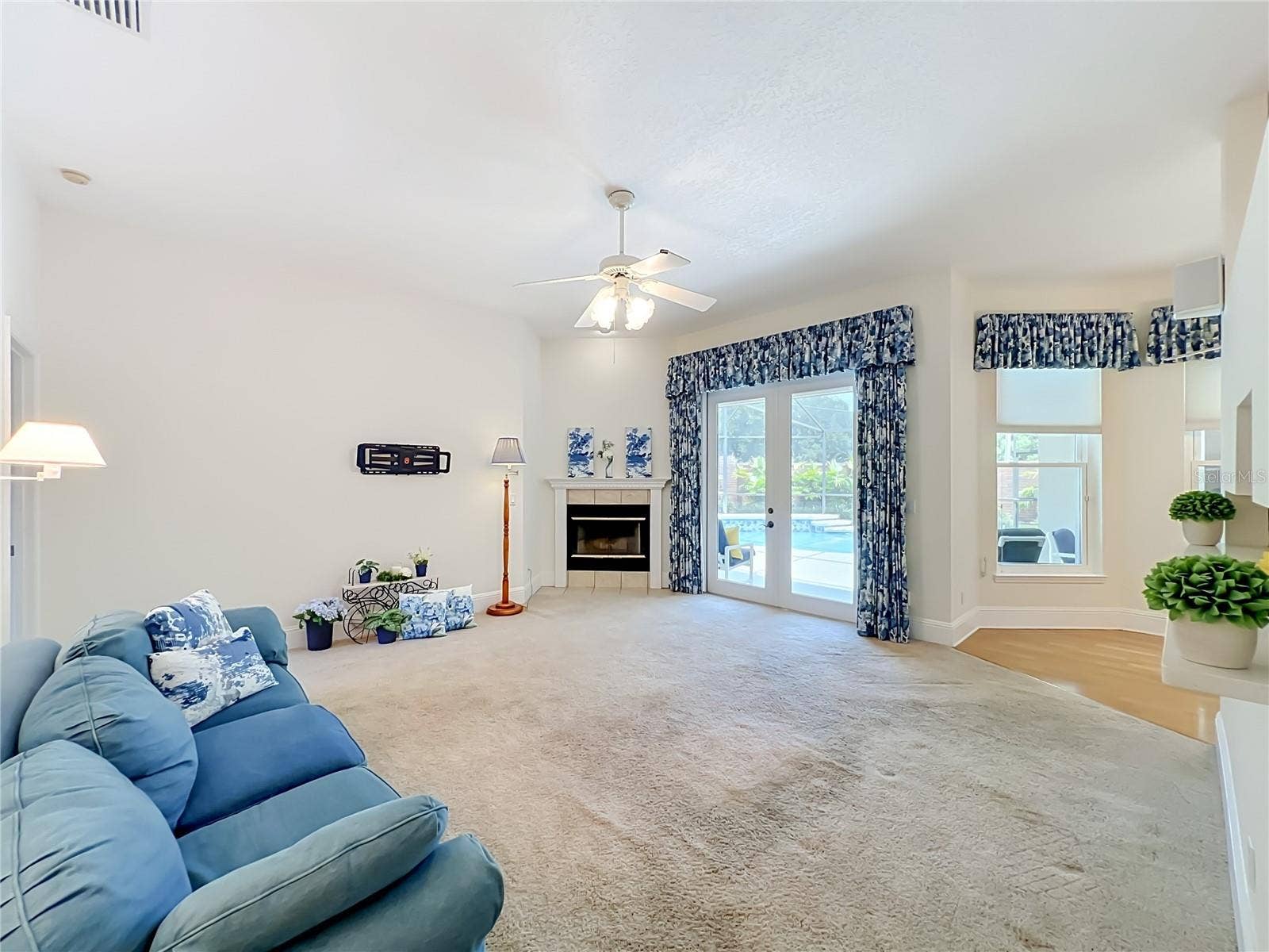 2667 COCHISE TRAIL, Winter Park, FL 32789 FAMILY ROOM WITH FRENCH DOORS TO POOL LANAI