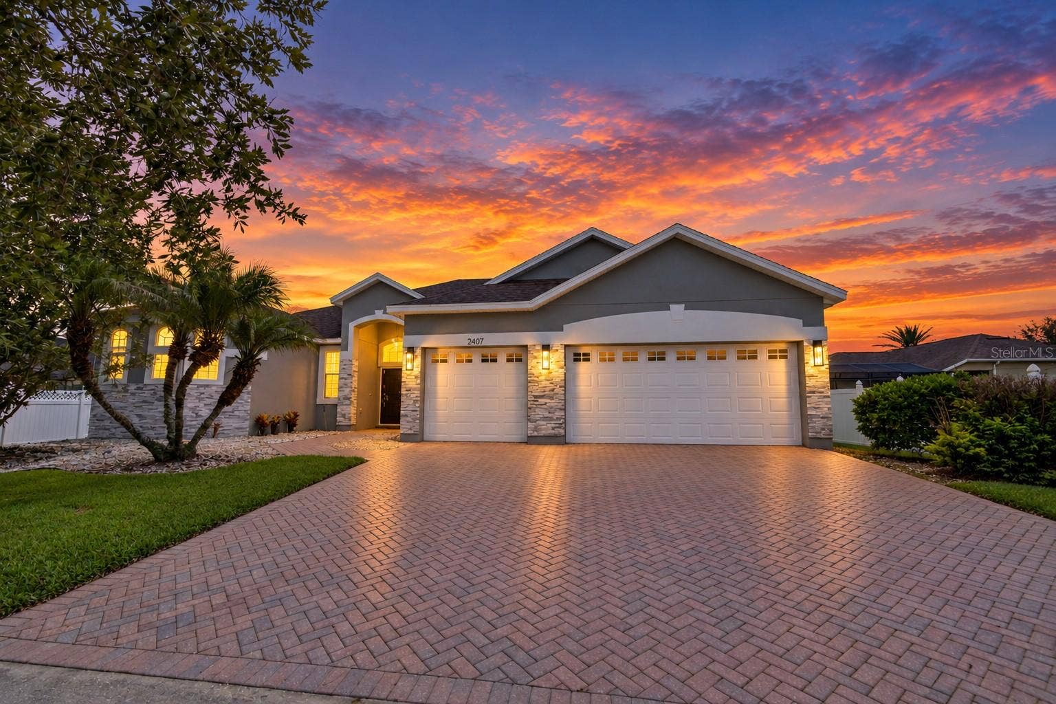 2407 FOLIAGE OAK TERRACE, Oviedo, FL 32766 Front Exterior at Sunset