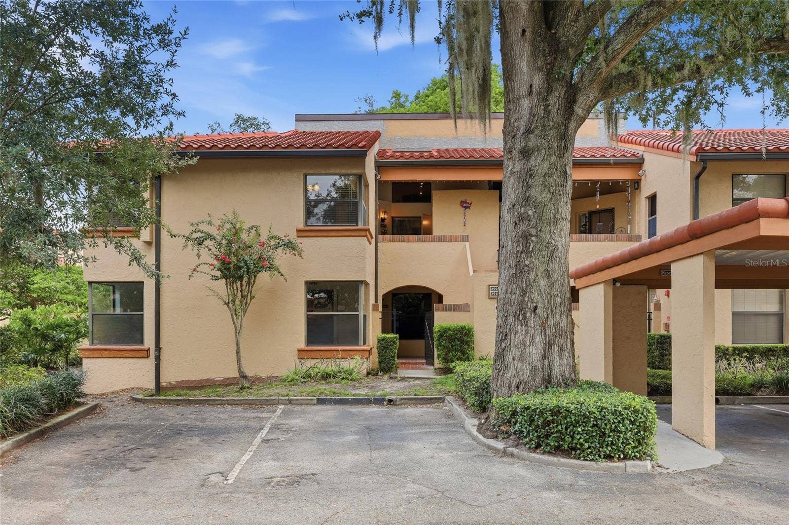 2922 LAKE PINELOCH BOULEVARD, #15-21, Orlando, FL 32806 Front of unit, view of the assigned covered parking.