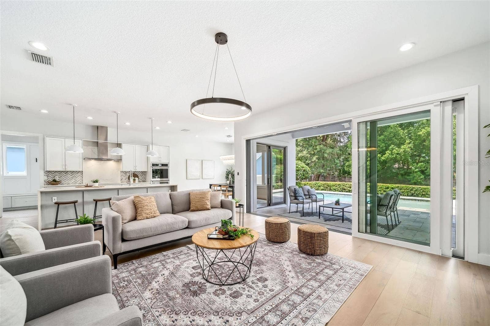 2407 LAFAYETTE AVENUE, Winter Park, FL 32789 Glass Sliding doors lead to lanai and pool area